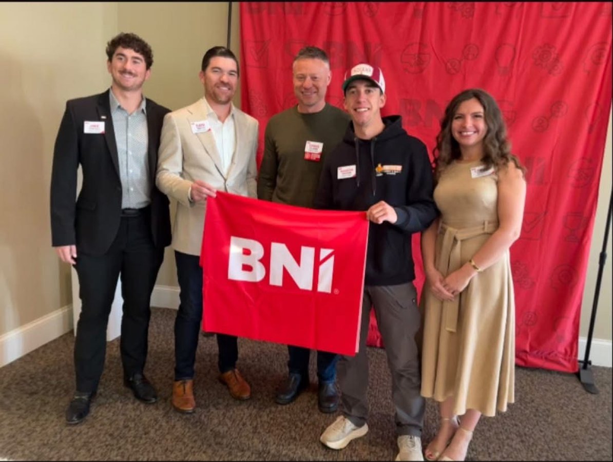 Lavinia Chudy with her BNI business networking group in Bloomington, Indiana